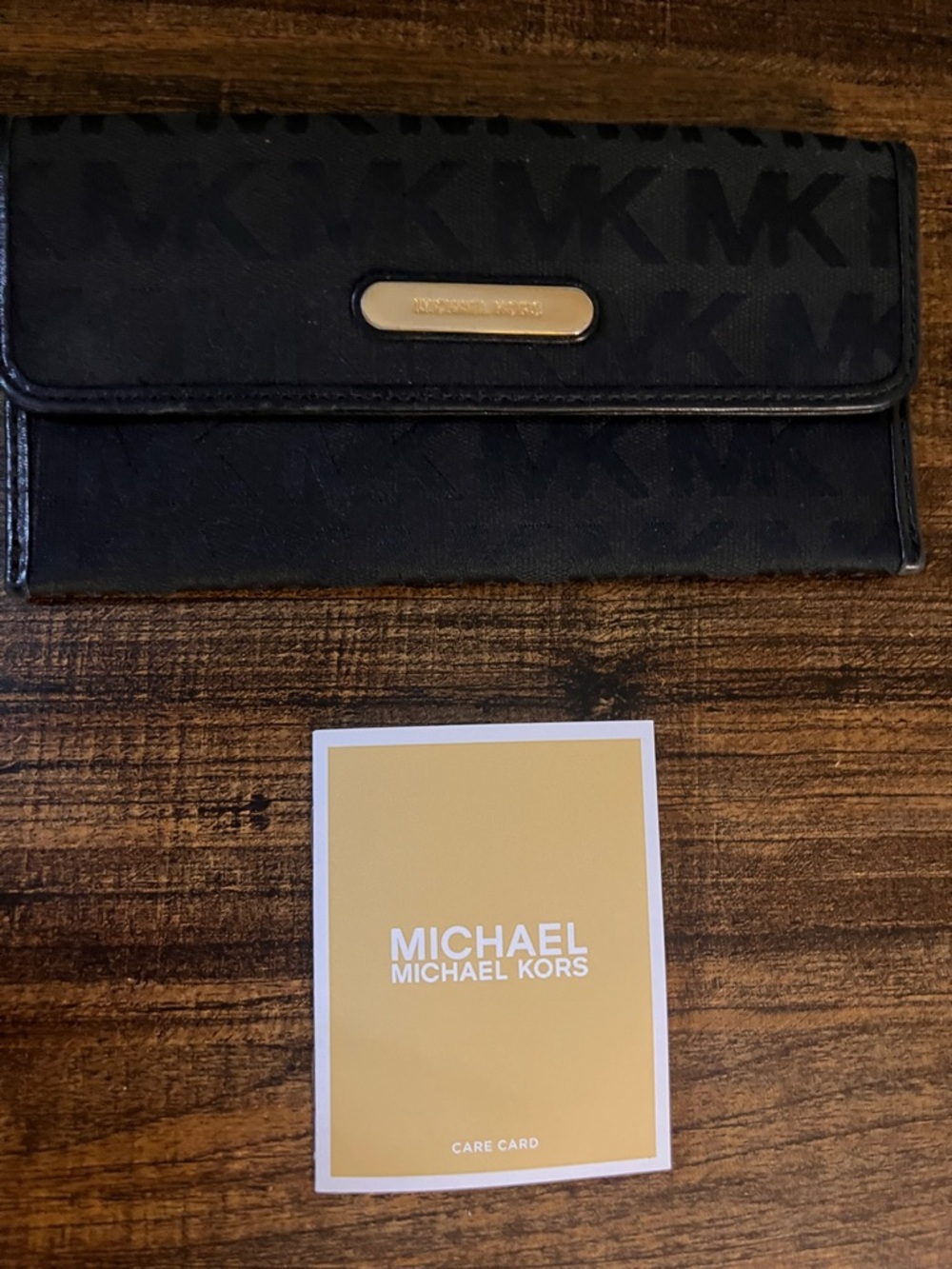Michael Kors Black MK Logo Continental Wallet with Gold Plaque